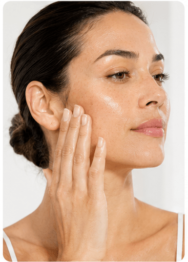 Massaging a milky cleanser onto skin